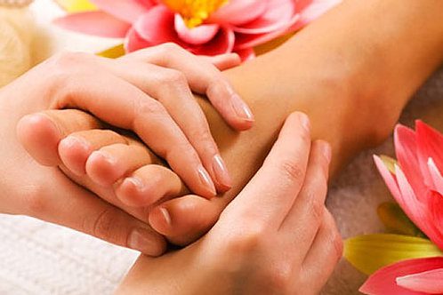 Atendimento de reflexologia nos pés